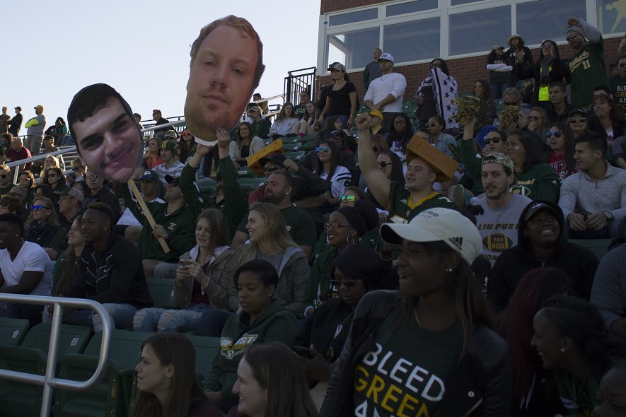 The crowd cheering on the football team at Homecoming. Photo: Paul Whitbeck