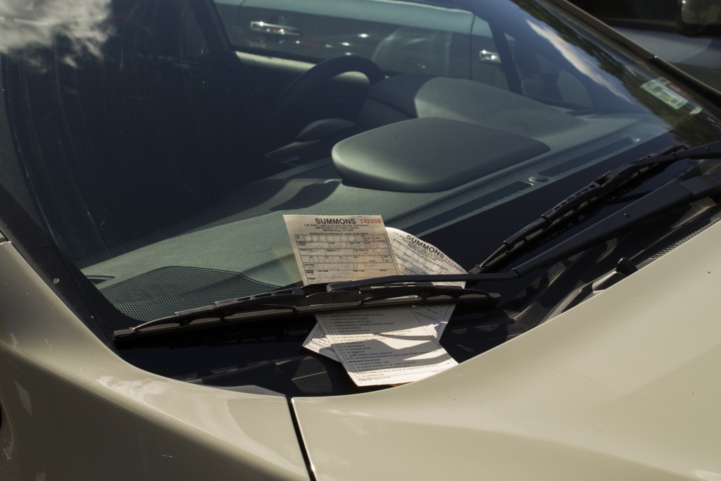 A car has been ticketed. Photo: Paul Whitbeck