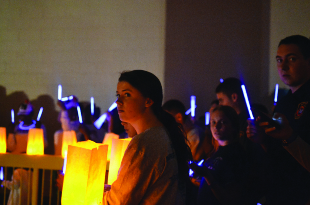 Students hold a luminary ceremony in honor of those battling cancer worldwide (2014.) Photo: Tia Mona Greene