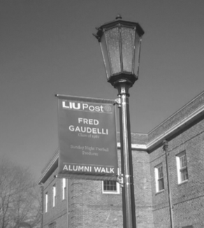 The Pioneer  Fred Gaudelli’s alumni banner outside Pell Hall. 
